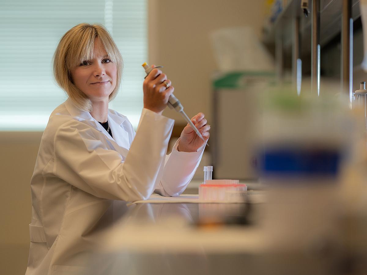 Leah Owen, MD, PhD, in her lab.